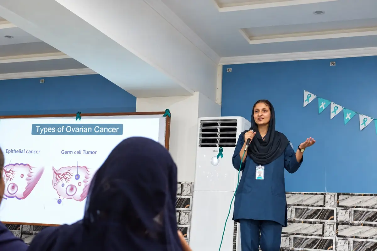 Student presenting at an ovarian cancer awareness seminar